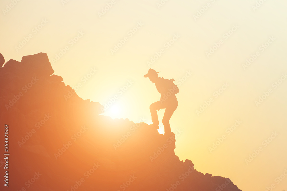 silhouette of a young man standing alone