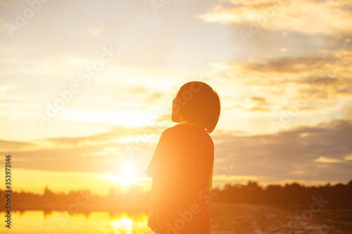 kid silhouette,Moments of the child's joy. On the Nature sunset