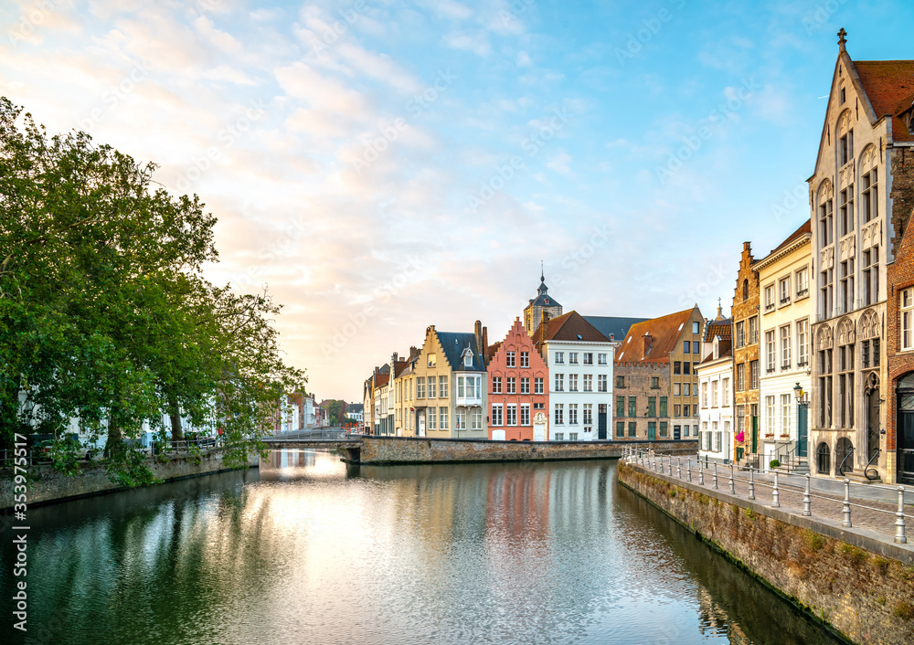 Morning panoramic city view with nice town and canal in Bruges, Belgium
