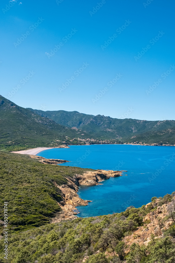 Rocky coast and deserted beach at Galeria in Corsica