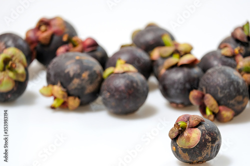 Close-Up Of Mangosteen Fruits On Table