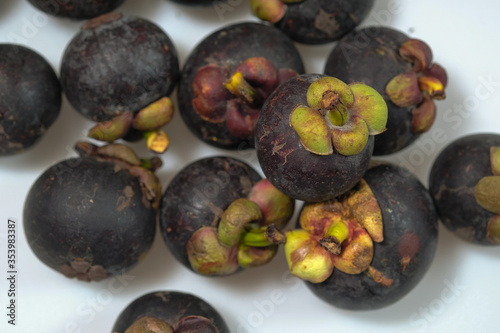 Close-Up Of Mangosteen Fruits On Table
