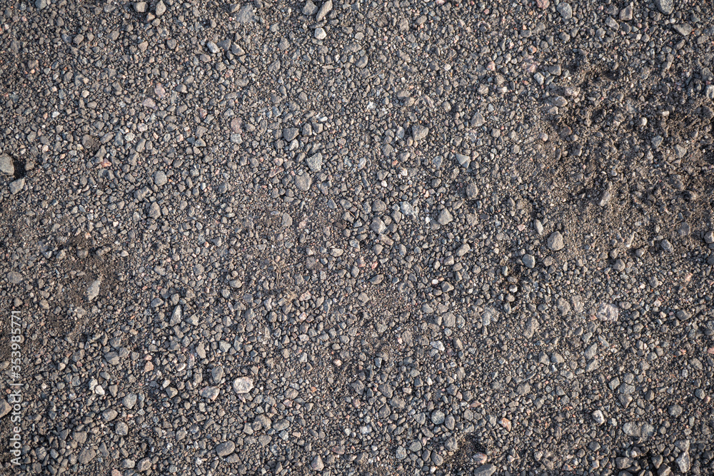 Background image of the surface of a gravel walking path Background image of the surface of a gravel walking path