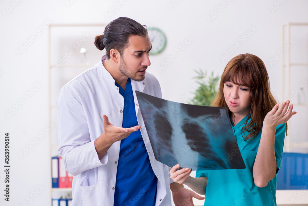 Two doctors colleagues working in the hospital Two doctors colleagues working in the hospital