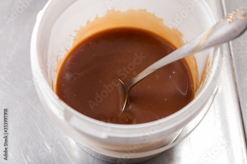 Molasses or treacle a viscous dark sugar syrup.