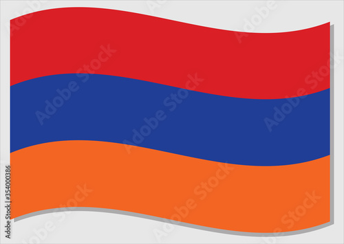 Waving flag of Armenia vector graphic. Waving Armenian flag illustration. Armenia country flag wavin in the wind is a symbol of freedom and independence.