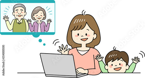 おじいちゃん、おばあちゃんとビデオ通話をする親子