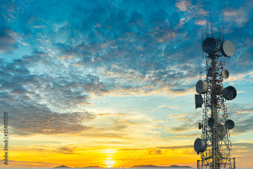 telecommunication tower at sunset sky background