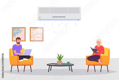 Room with air conditioning and people. Man and a woman work on laptop, relax at home in room with cooling. Concept of climate control indoors.
