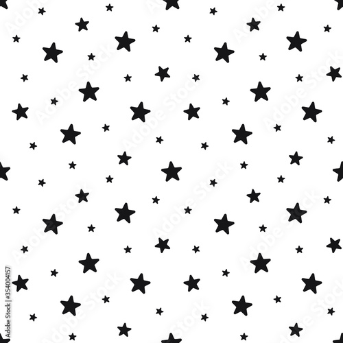 Star seamless pattern. Night, space or christmas theme. Flat vector background in black and white. © Maksim