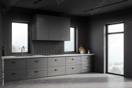 Grey kitchen corner with wooden countertop