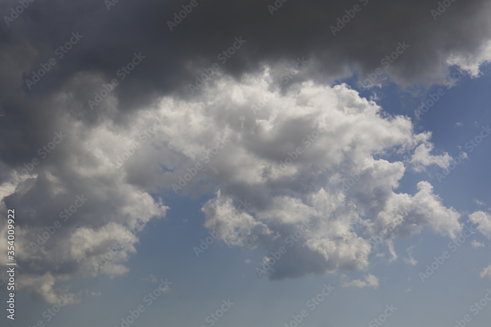 white fluffy clouds in the blue sky. white fluffy clouds in the blue sky.