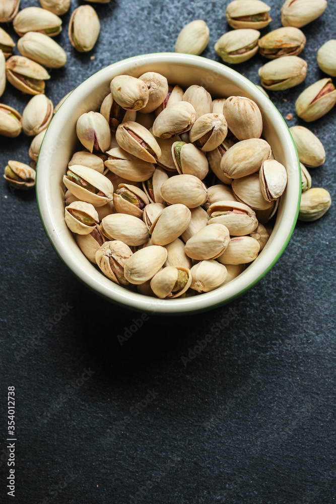 pistachios
Menu concept serving size. food background top view copy space for text
keto or paleo diet
organic healthy eating pistachios
Menu concept serving size. food background top view copy space for text
keto or paleo diet
organic healthy eating