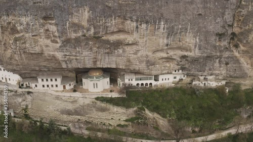 Bakhchysarai Cave Monastery, also known as Assumption Monastery of the Caves. Aerial footage 4k