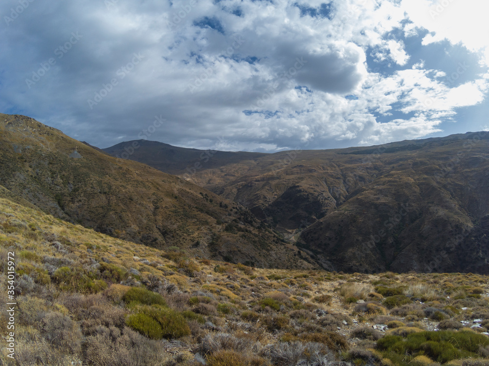 Fototapeta premium mountain landscape with blue sky and clouds 