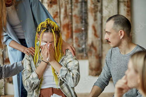 Photography caucasian woman cry after heartbreaking story about alcoholism, members of anony