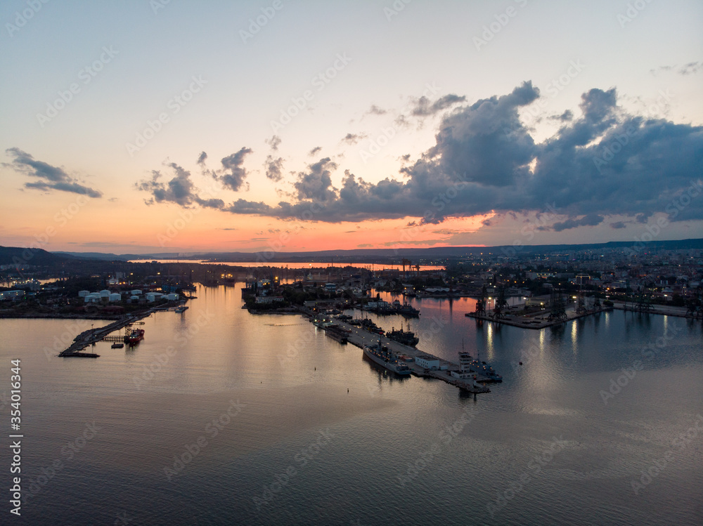 Drone View of the Sea and the Varna Sea Port at sunset time with dramatic sky