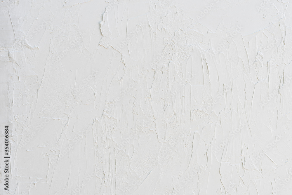 White texture painted with irregular brush strokes. Minimal rustic wall background