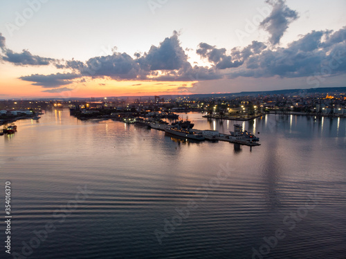 Drone View of the Sea and the Varna Sea Port at sunset time with dramatic sky © imagestock