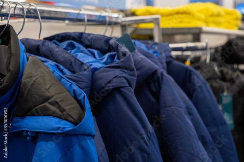 Sportswear is hung on the clothes line in the mall for sale to athletes. To exercise