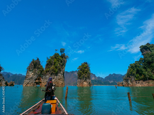 Boating between rock formations in Khao Sok Lake