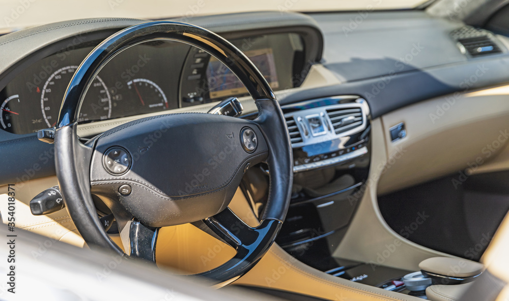 interior of a luxury car, noble materials and quality workmanship interior of a luxury car, noble materials and quality workmanship