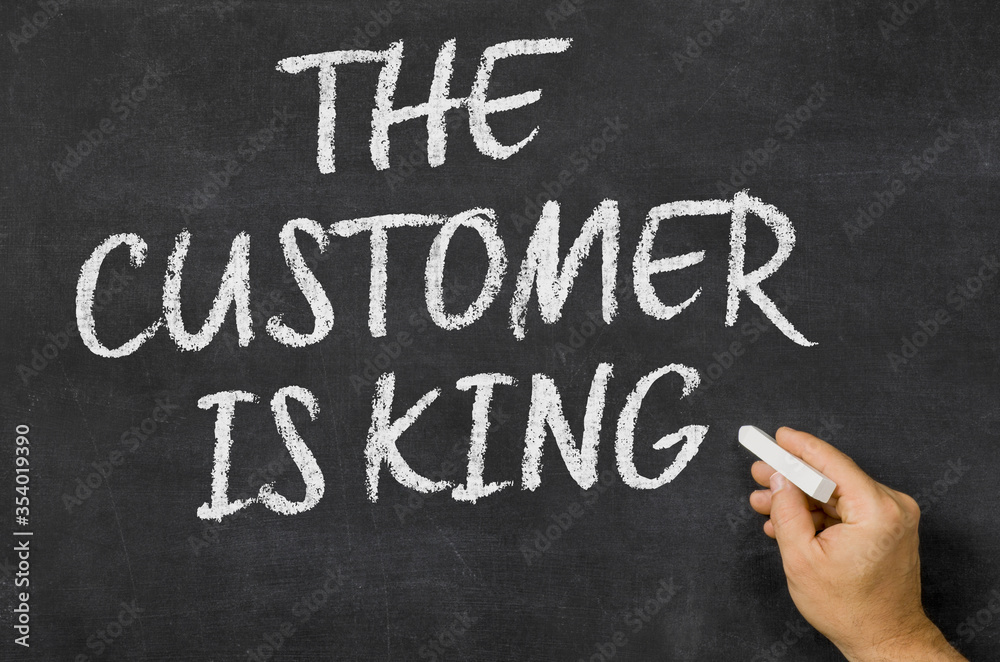 Fototapeta premium The customer is king written on a blackboard