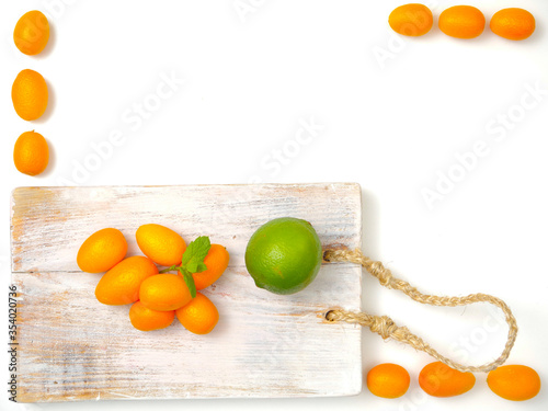 Owoce, miniaturowe mandarynki, kumkwat photo