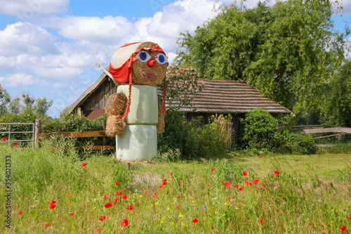 Straw doll on a field in Potsdam-Mittelmark, federal state Brandenburg - Germany
 photo
