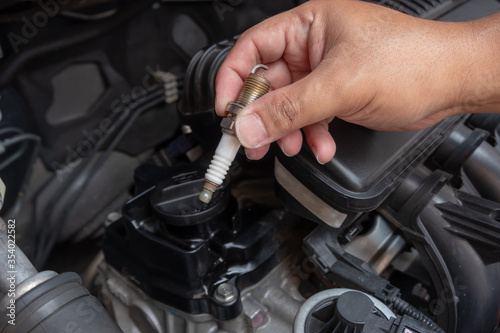 Mechanic checks the car condition