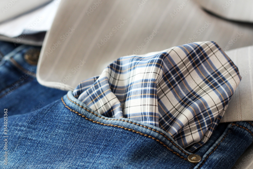 Blue jeans detail with empty pocket Blue jeans detail with empty pocket