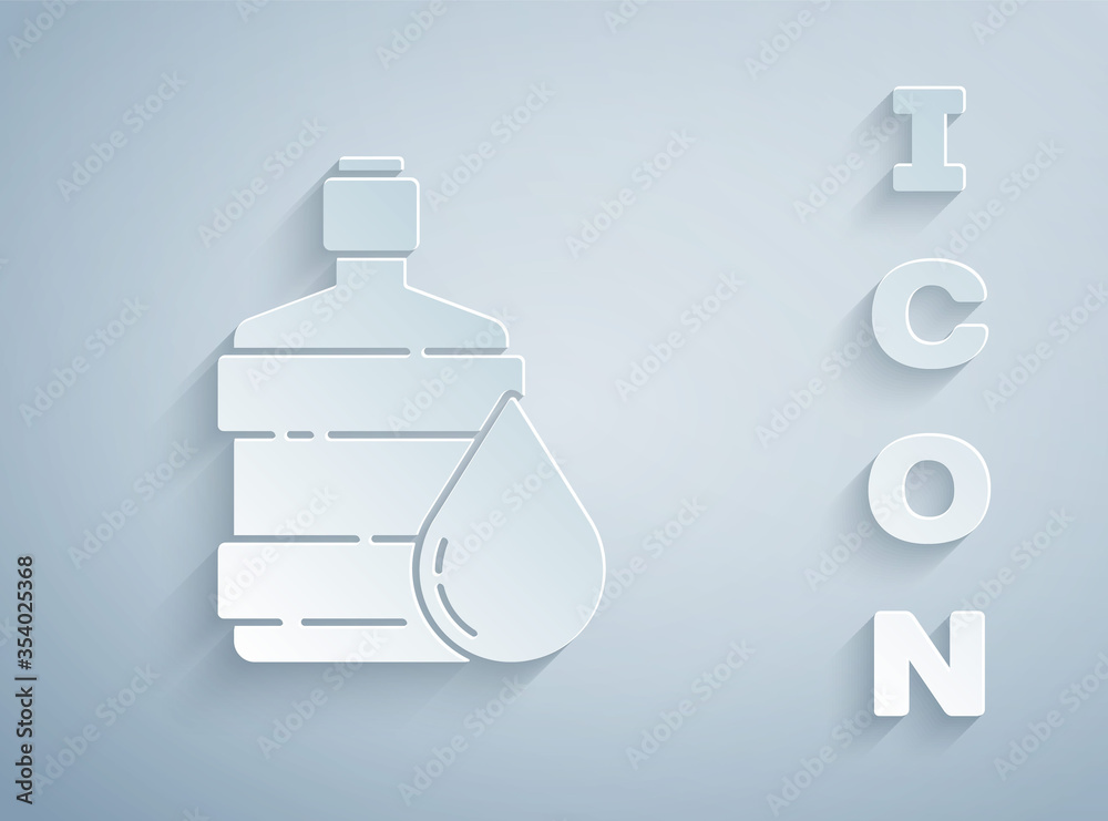 Paper cut Big bottle with clean water icon isolated on grey background. Plastic container for the cooler. Paper art style. Vector Illustration. Paper cut Big bottle with clean water icon isolated on grey background. Plastic container for the cooler. Paper art style. Vector Illustration.