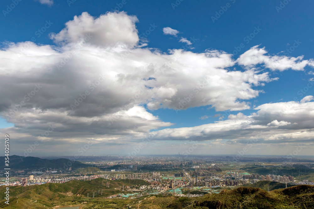 skyline of beijing city with cloudy sky