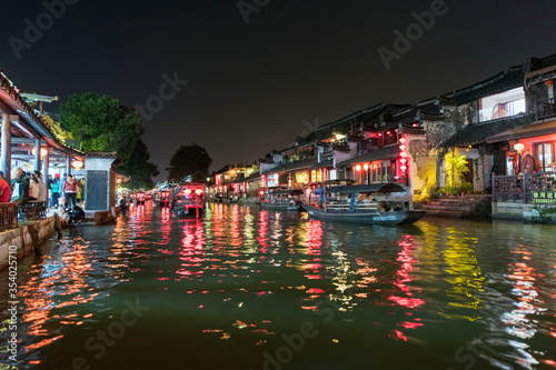 night scene of old water town with lantern 