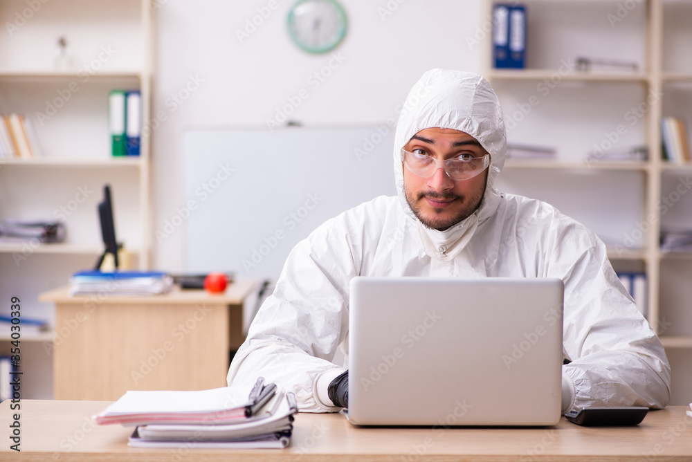 Office worker working in quarantine self-isolation Office worker working in quarantine self-isolation