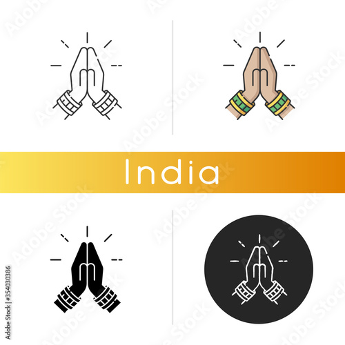 Namaste icon. Hindu greeting. Hands pressed together. Respectful salutation. Anjali Mudra. Praying hands. Indian religion. Linear black and RGB color styles. Isolated vector illustrations
