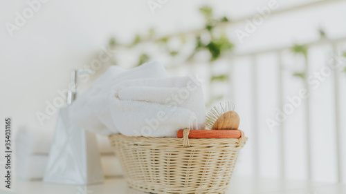 White towel with basket in bathroom