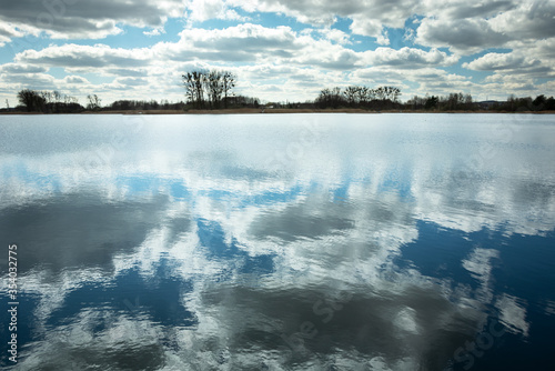 Clouds reflecting in a calm lake © darekb22