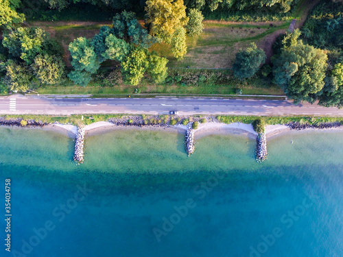 Fototapeta Naklejka Na Ścianę i Meble -  4k photo Evian-les-Bains city on the Geneva Lake, Haute-Savoie, France, Europe, drone Aerial View