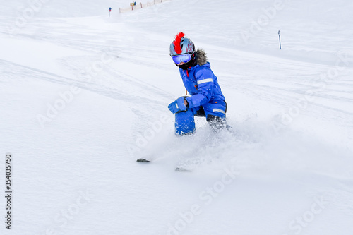 Young skier on the slope.