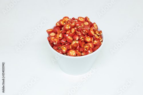 Sliced ​​red peppers in cup