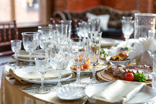 Table setting, glasses on table in restaurant  © cmirnovalexander