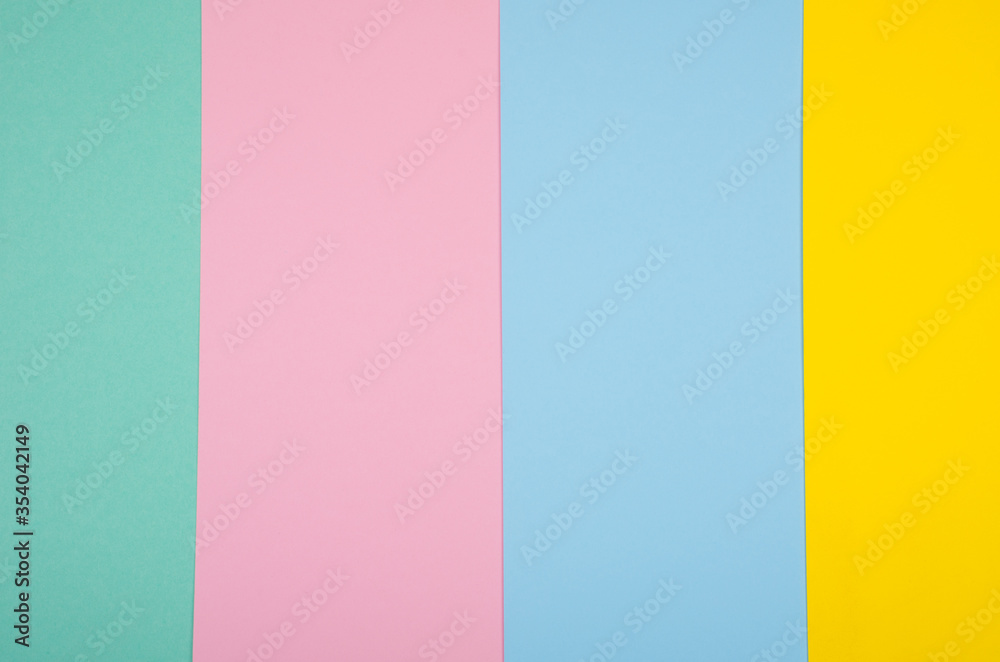 Sheets of paper of different colors as a bright multicolored paper background