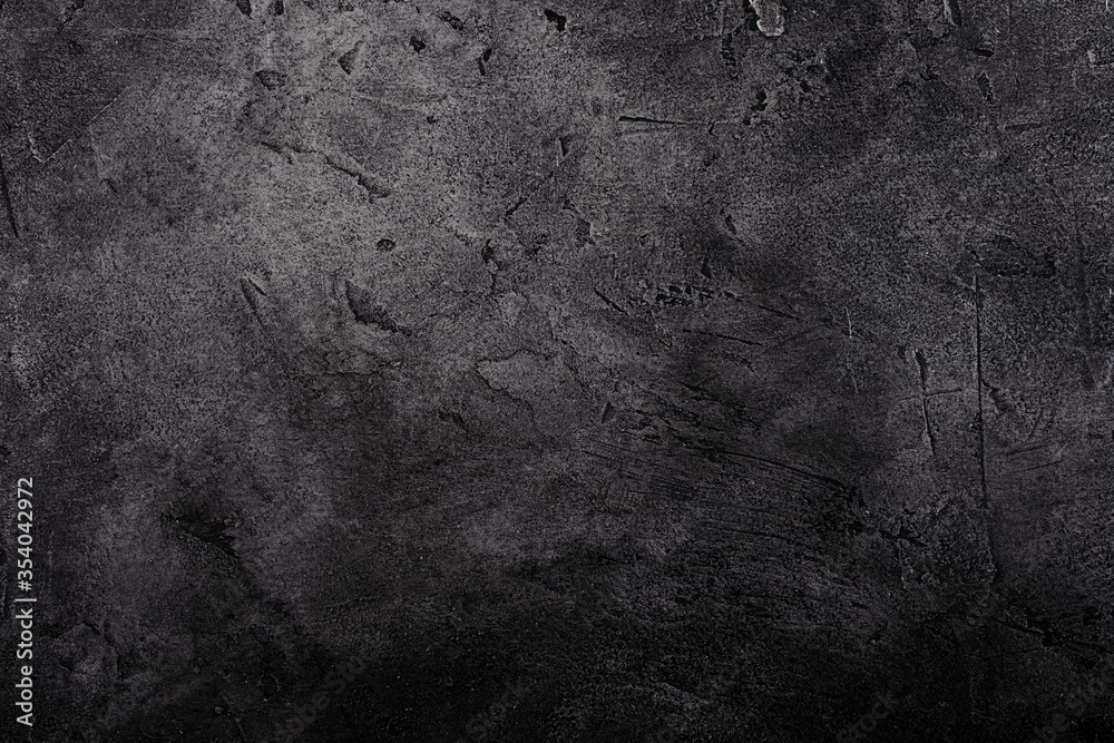 Black marble or concrete background (as an abstract background or stained marble or concrete texture)