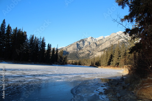 Looking Down The Frozen Bow River, Banff National Park, Alberta