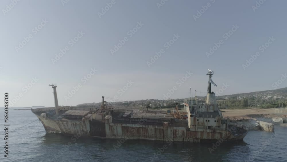Aerial shot of a flooded ship Cyprus. Sea, broken ship, waves, rocks, death ship, landscape, nature, nature's collision with technology, drone video.
Aerial shot of a flooded ship Cyprus. Sea, broken ship, waves, rocks, death ship, landscape, nature, nature's collision with technology, drone video.
