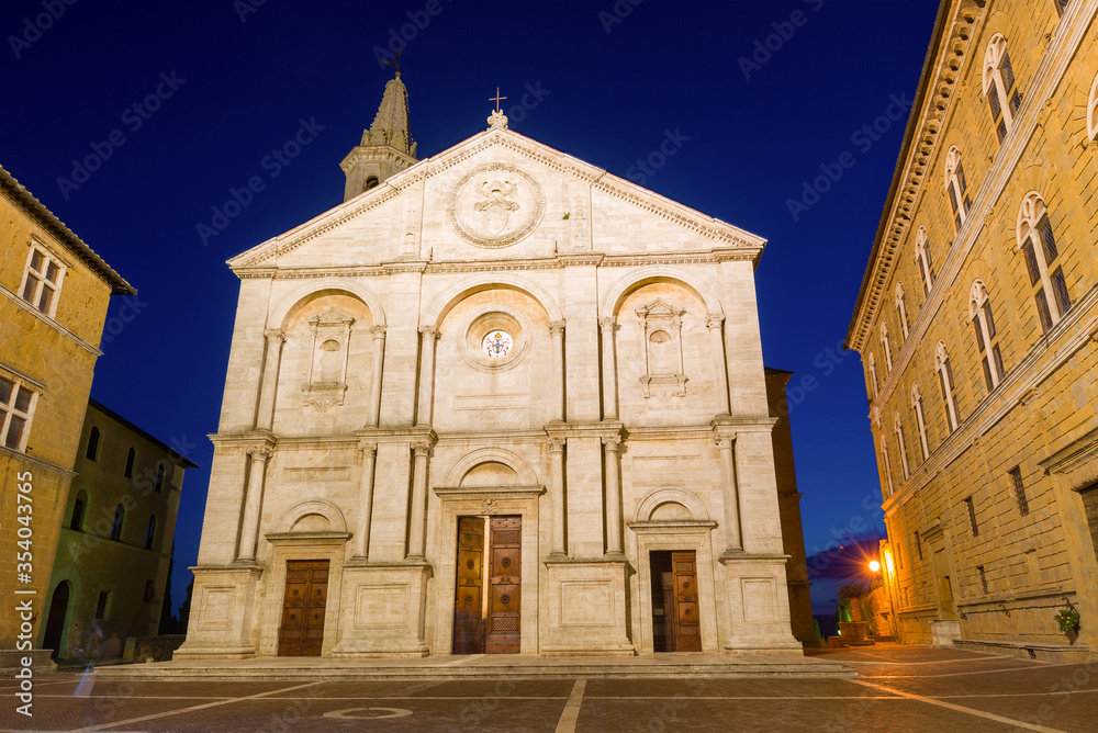 The medieval cathedral of Duomo di Pienza Santa Maria Assunta in the late evening. Pienza, Italy