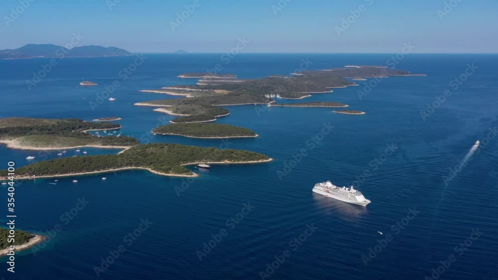 Aerial view on islands on sea. Azure water and islands with trees. Seascape from air at the summer time. Travel - image Aerial view on islands on sea. Azure water and islands with trees. Seascape from air at the summer time. Travel - image
