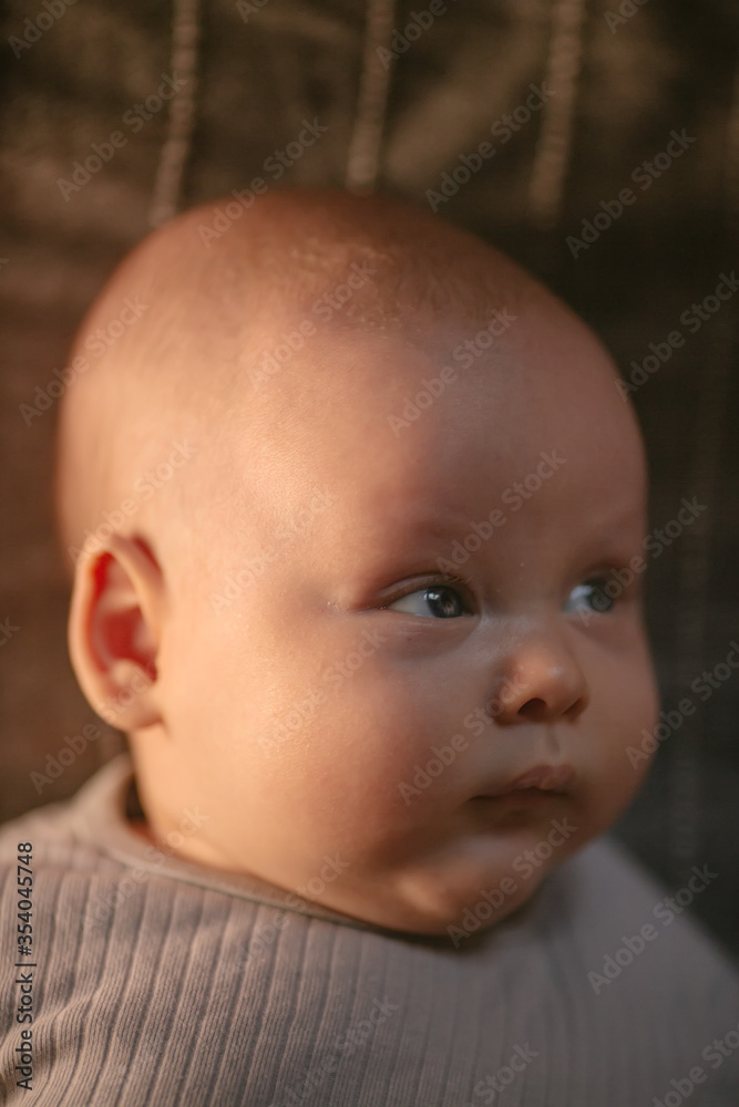 Portrait of a beautiful baby with blue eyes and brown hair Portrait of a beautiful baby with blue eyes and brown hair