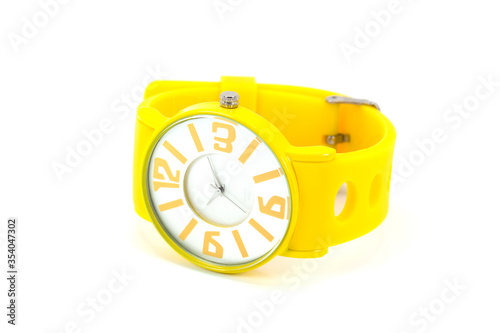 Yellow wrist watch isolated on white